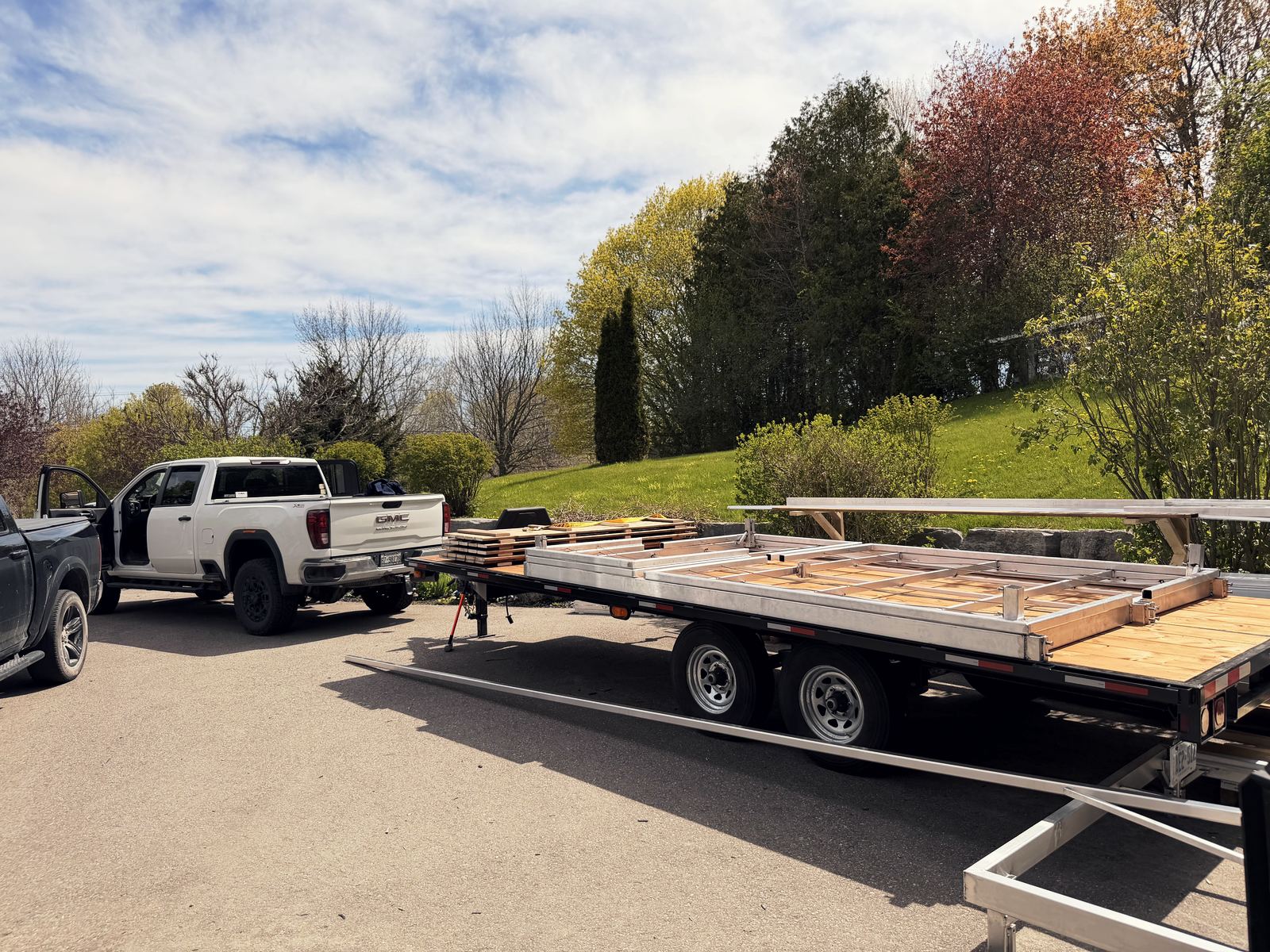 Dock frames and cedar decking panels stacked on a trailer